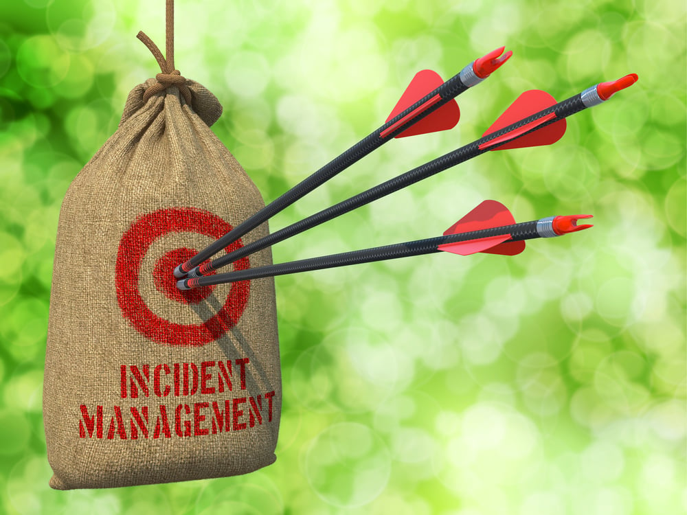 Incident Management - Three Arrows Hit in Red Target on a Hanging Sack.